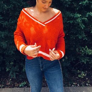 orange/red sweater